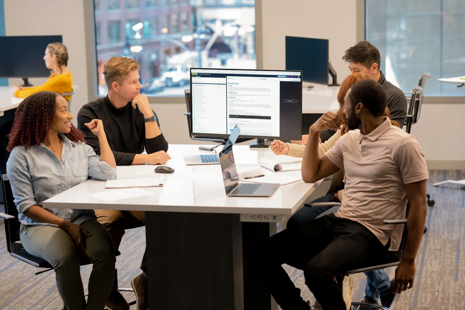 group of five students studing